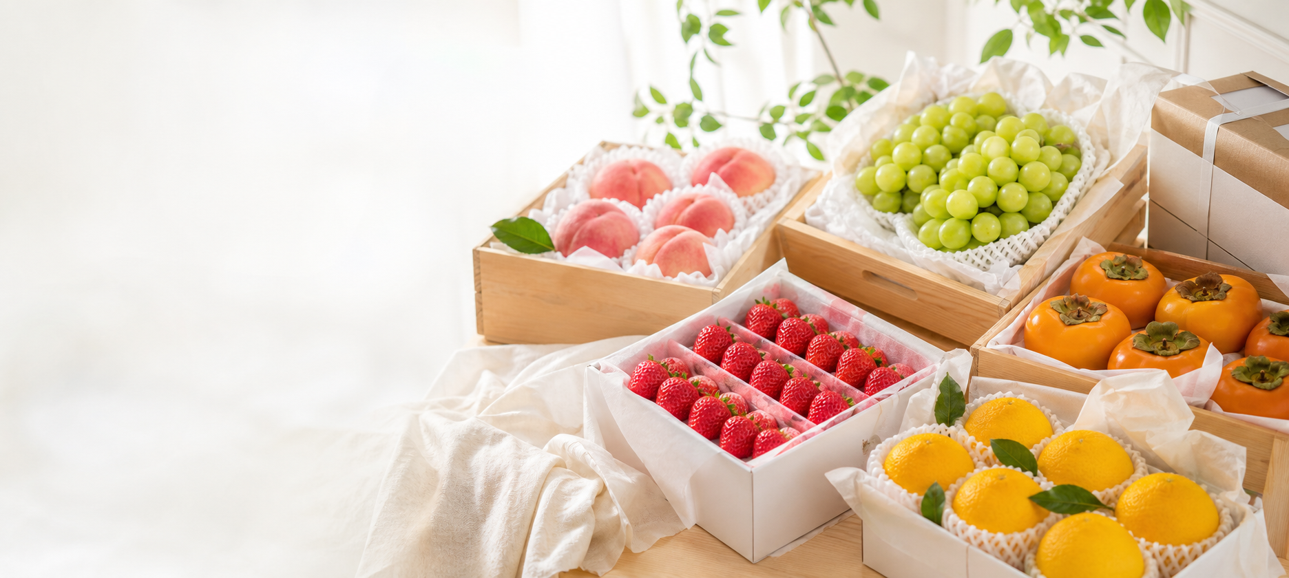 Premium fruit gift boxes with grapes, peaches, strawberries, persimmons and citrus